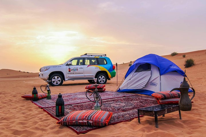 Experience the serene beauty of the Liwa Desert as you camp beneath the stars enjoy aromatic barbecues and explore the untouched sands creating unforgettable memories.